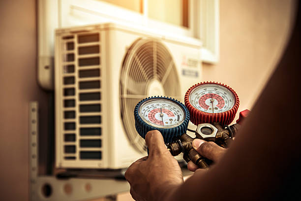 Professional Air Conditioning Service technician working in North Granville, NY